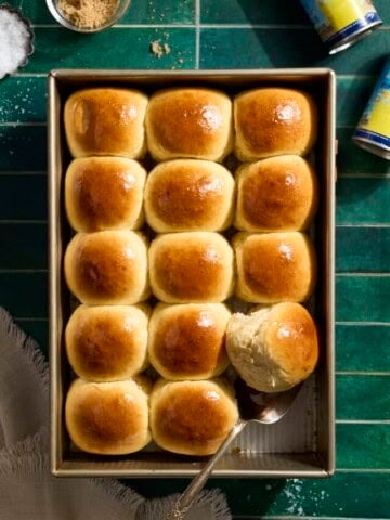 An overhead view of Sourdough Discard Hawaiian Rolls in the pan.