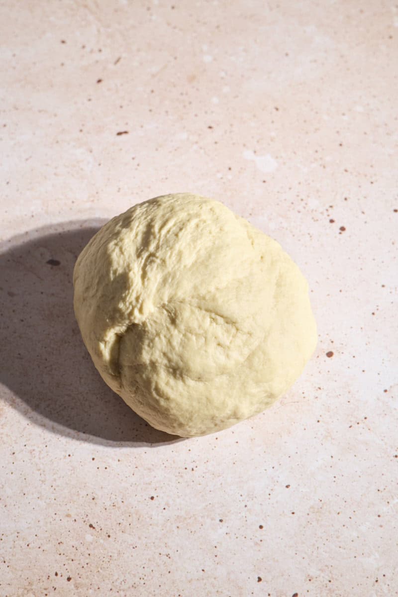 Dough in a ball after being kneaded.