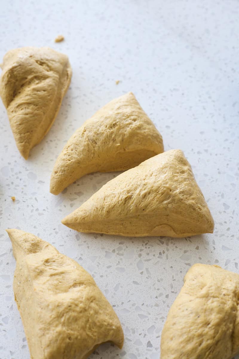 Dough divided into equal-size portions.