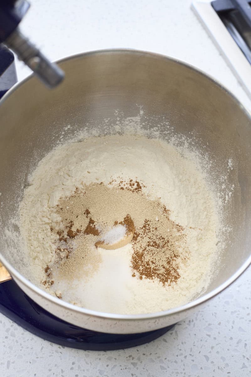 Dry ingredients in the bowl of a stand mixer.