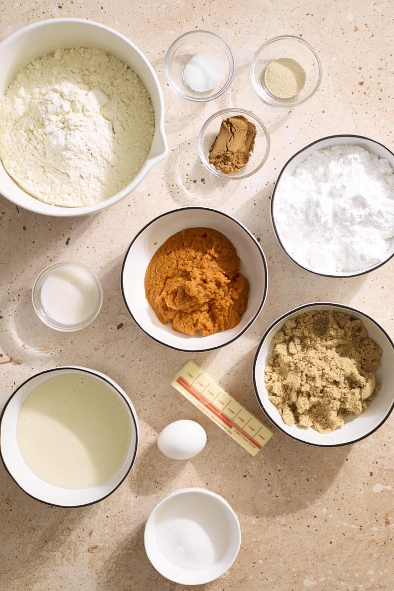 Ingredients for Sourdough Discard Pumpkin Cinnamon Rolls in small bowls.