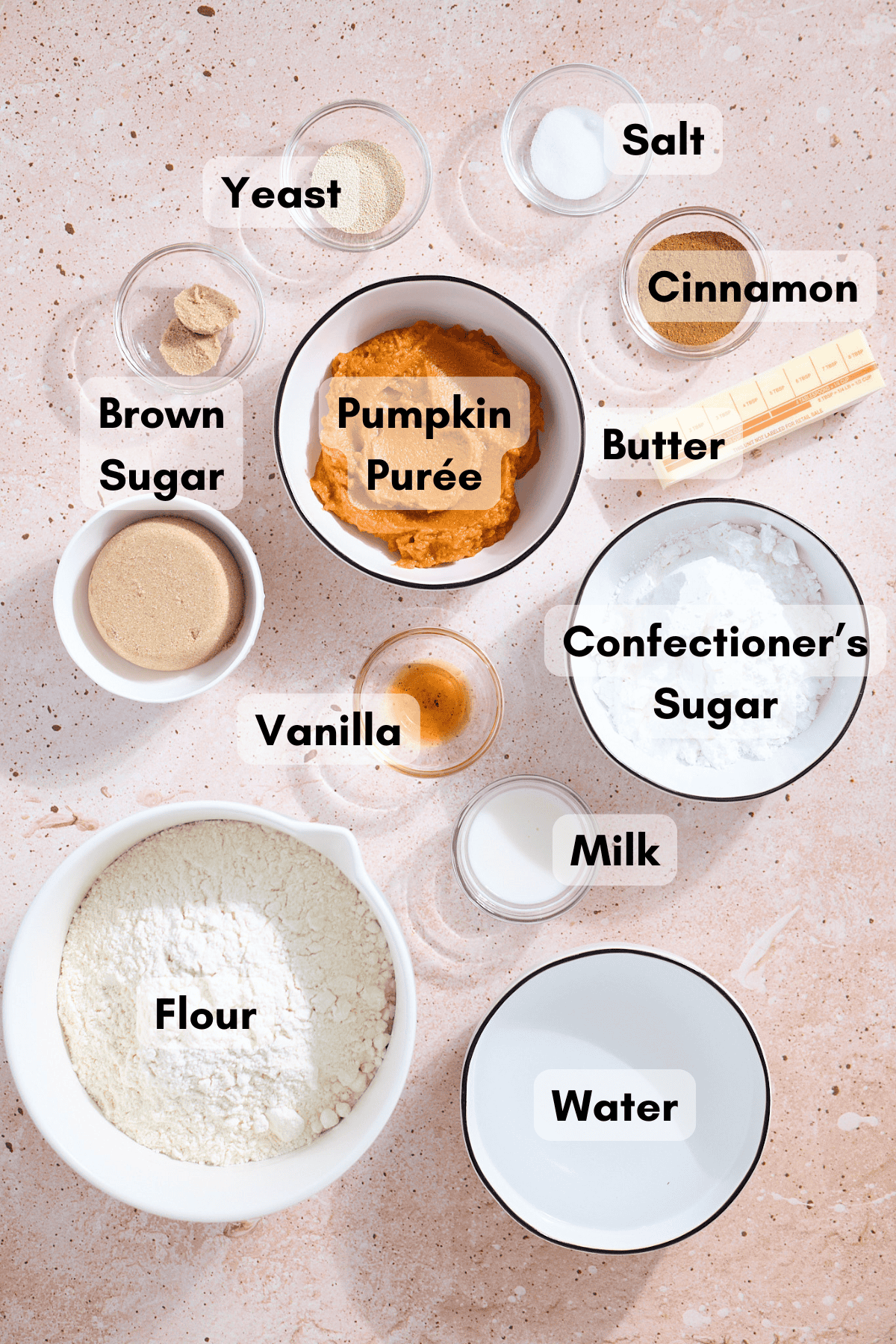 Ingredients for Pumpkin Cinnamon Roll Focaccia in small bowls. 