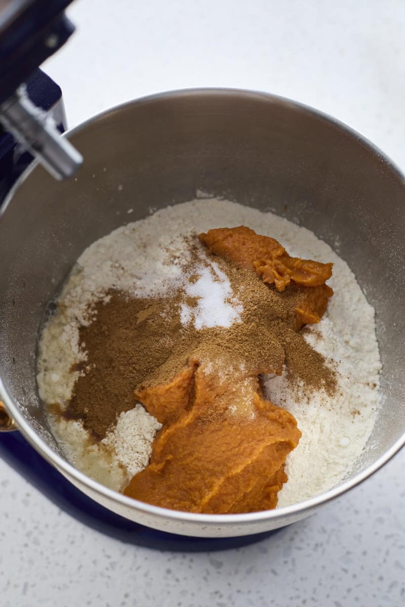 Ingredients in the bowl of a stand mixer.
