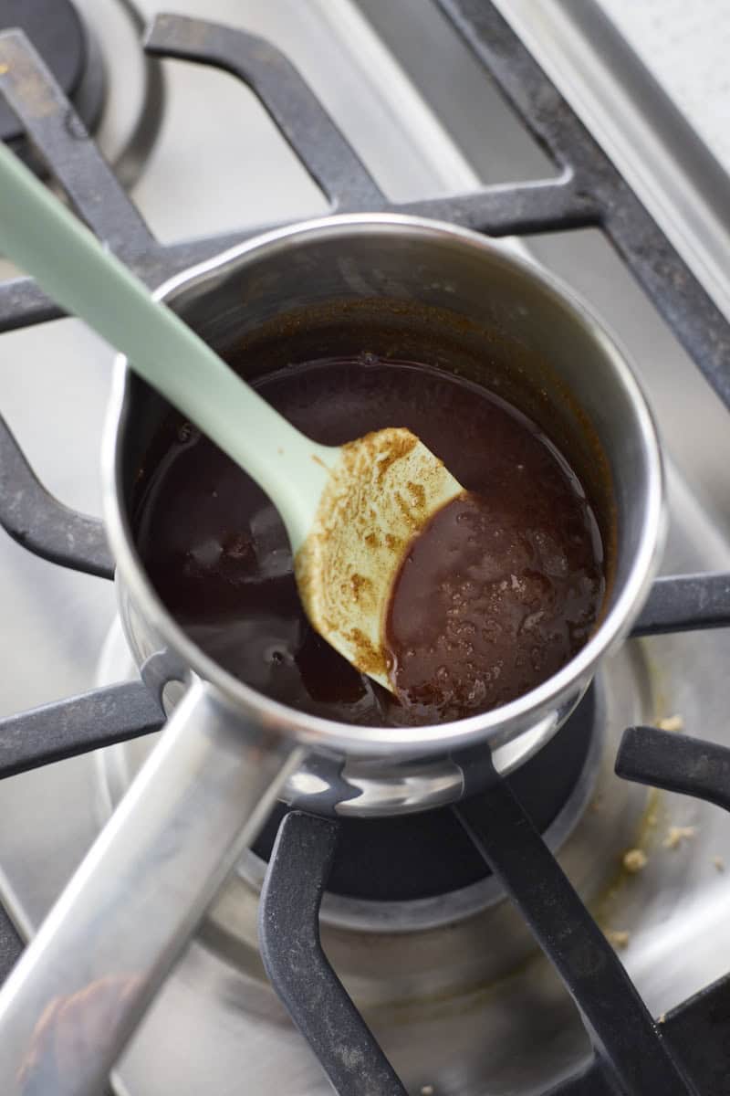 Topping mixed in a small saucepan on the stovetop.
