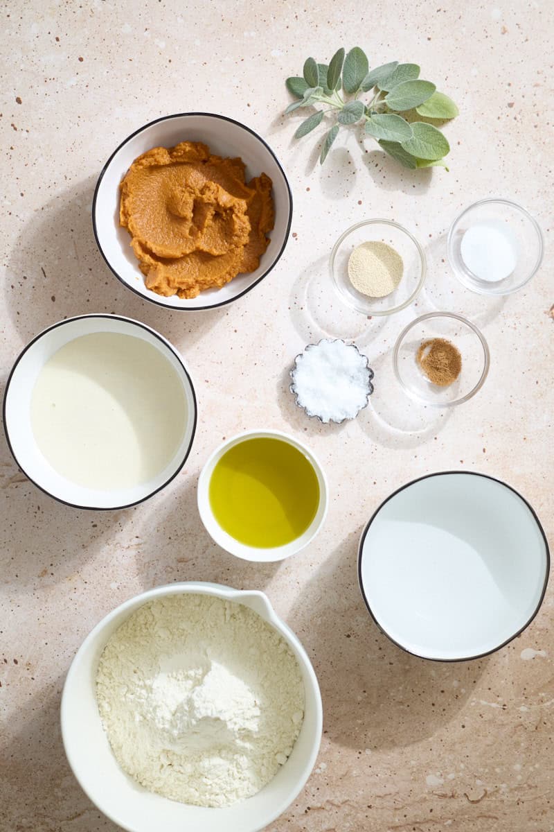 Ingredients for Sourdough Discard Pumpkin Focaccia in small bowls.