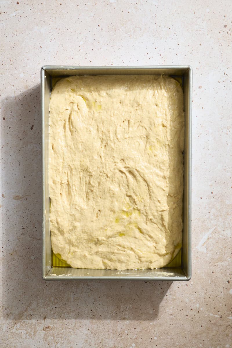 Dough spread in the 9x13-inch baking pan.