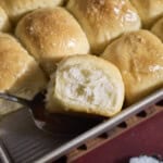 A side view of a Sourdough Discard Roll in the baking pan.