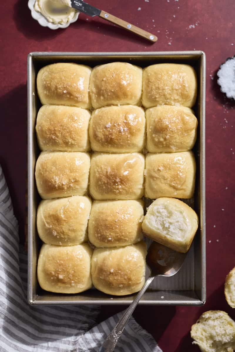 An overhead view of Sourdough Discard Rolls in the baking pan.