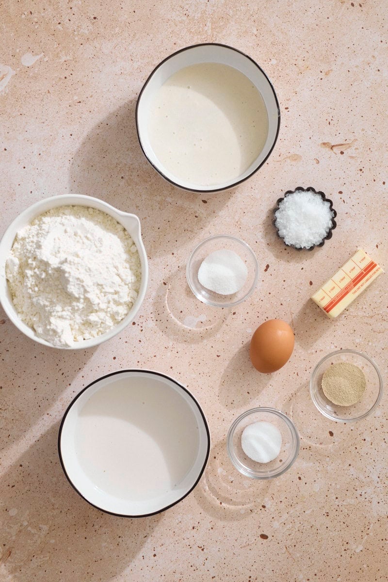 Ingredients for Sourdough Discard Rolls in small bowls.