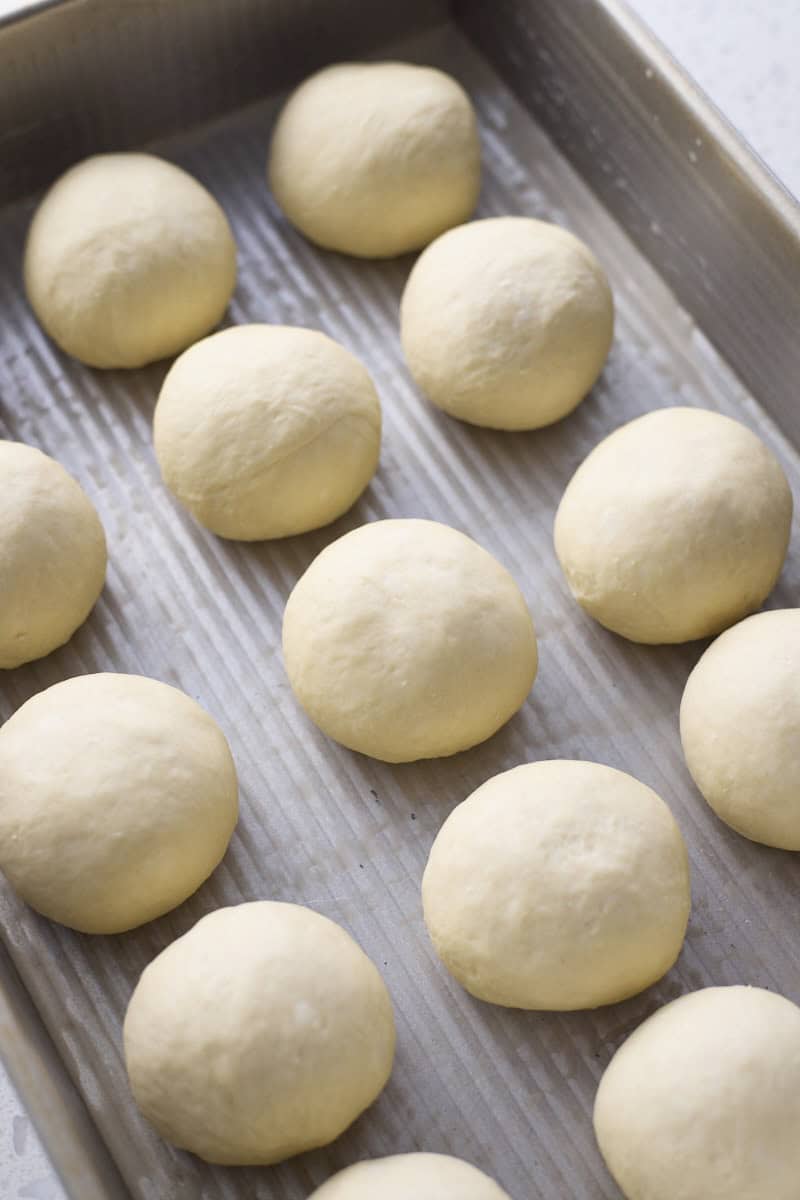 Dough shaped into rolls and placed in the baking pan.