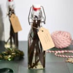 Two bottles of Homemade Vanilla Extract with brown tags.