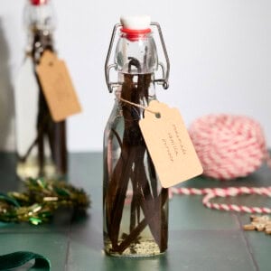 Two bottles of Homemade Vanilla Extract with brown tags.