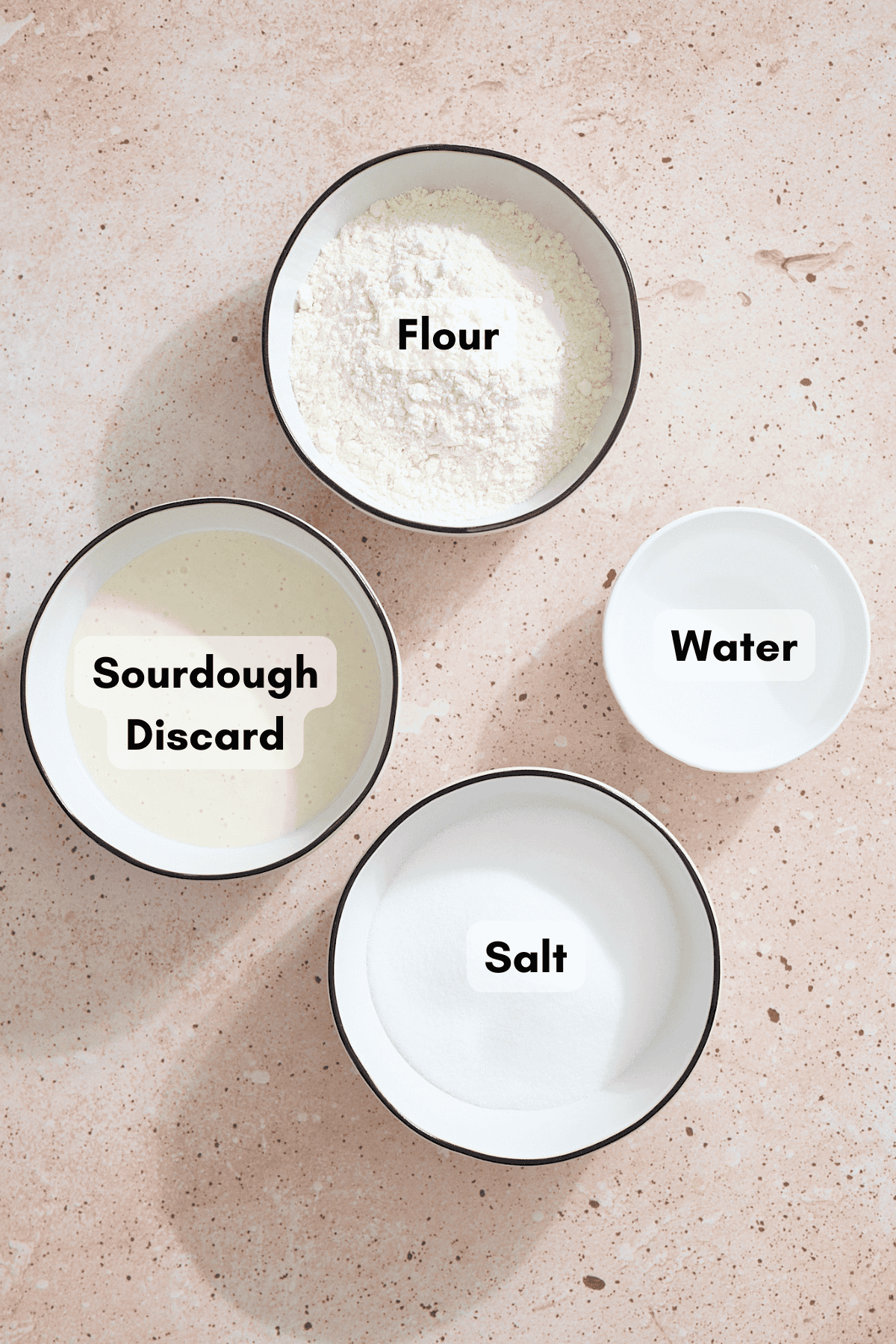 Ingredients for Sourdough Discard Salt Dough Ornaments in small bowls.