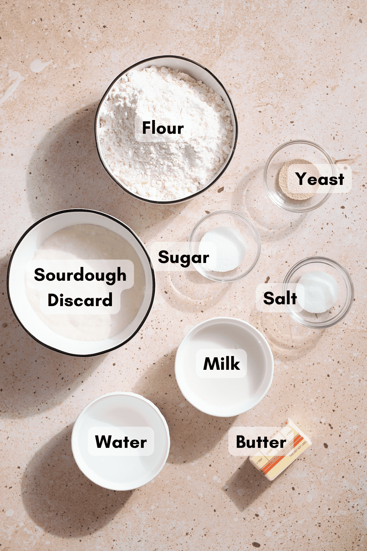 Ingredients for Sourdough Discard Sandwich Bread in small bowls. 