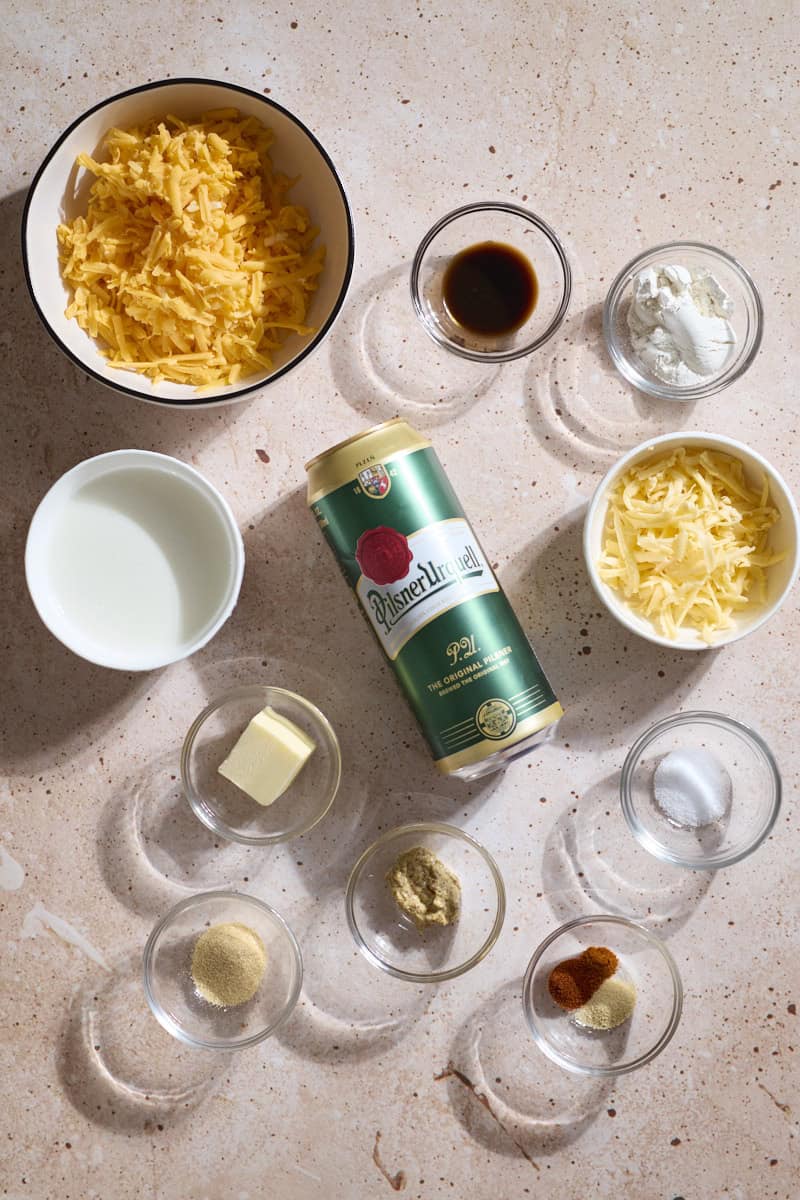Ingredients for Beer Cheese in small bowls.