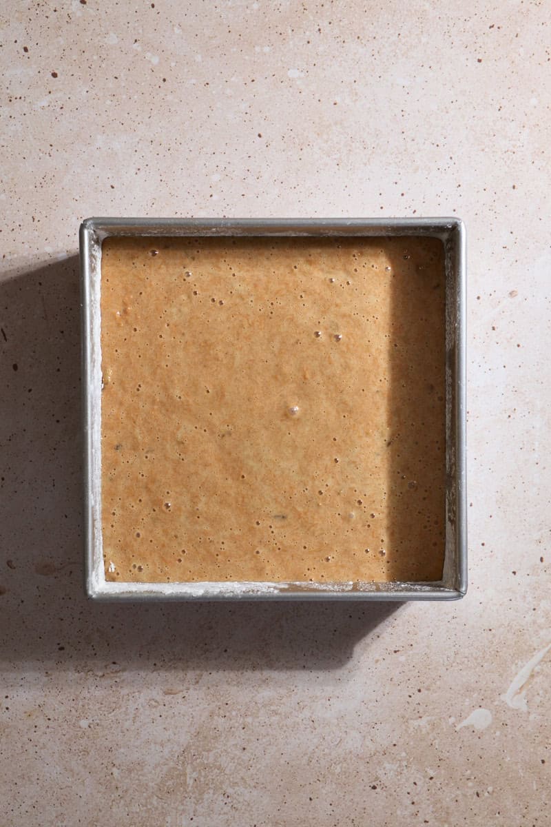 Batter poured into a 9x9-inch baking pan.