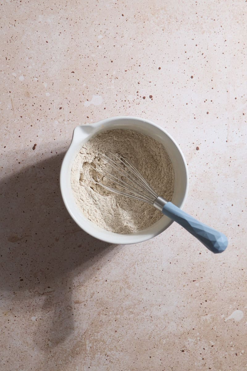 Dry ingredients whisked together in a small bowl.