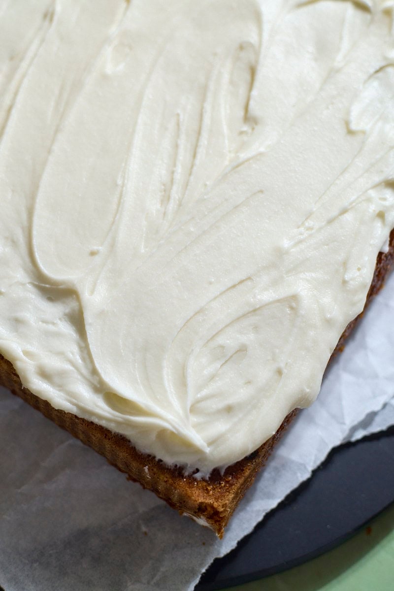 Icing spread on top of the cake.