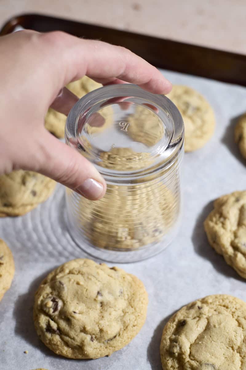 A glass on top of a cookie.