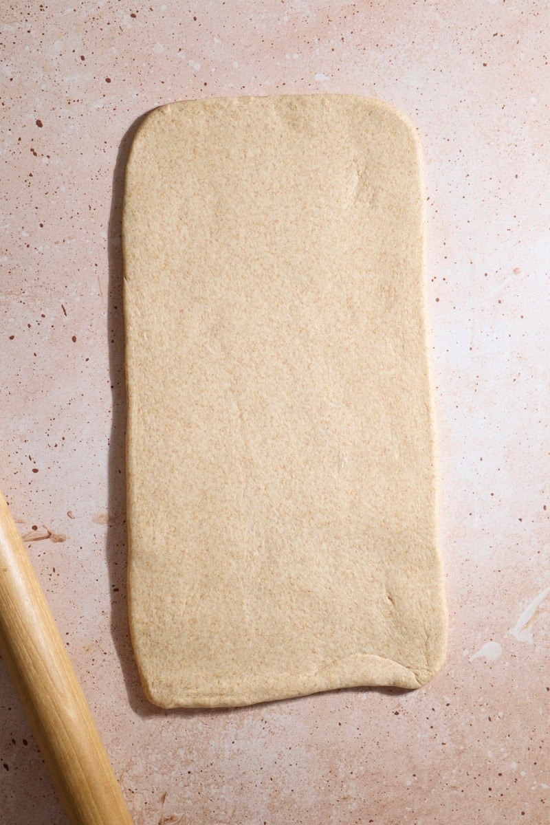 Dough rolled into a rectangle.