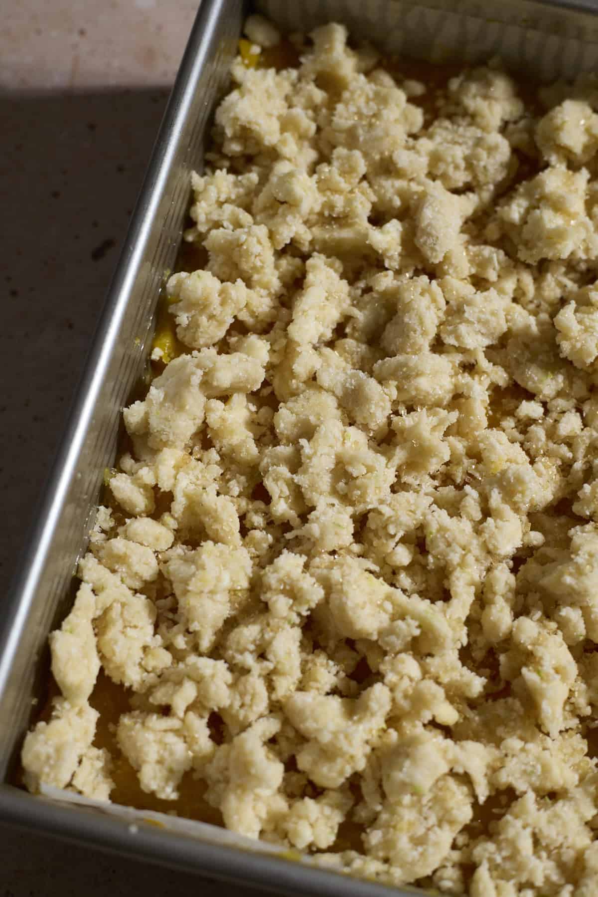 Crumbles on top of the mango bars.