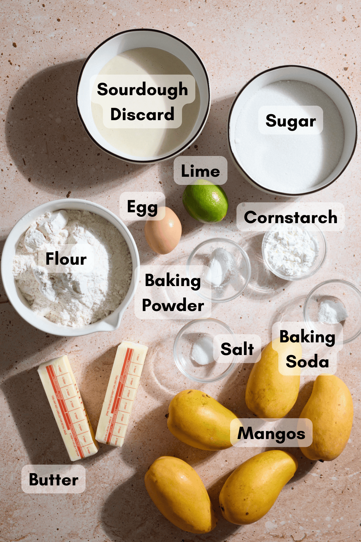 Ingredients for Sourdough Discard Mango Bars in small bowls.