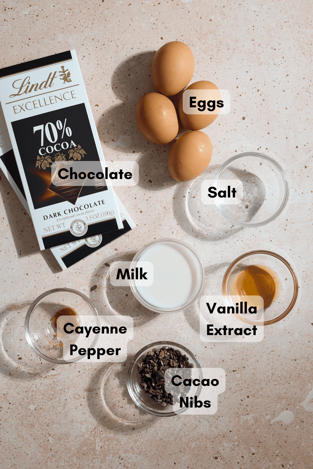 Ingredients for dairy-free chocolate mousse in small bowls.