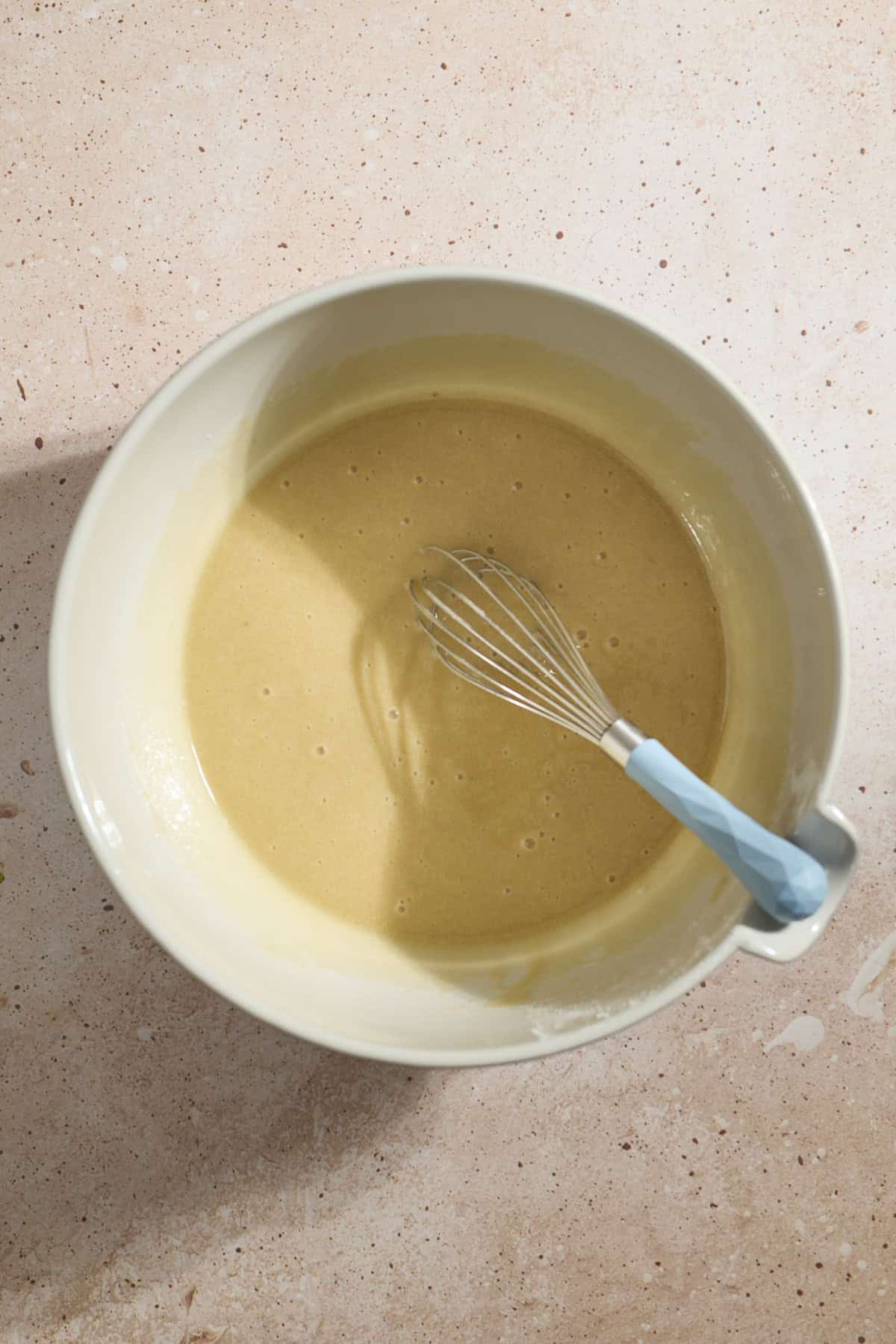 Wet ingredients mixed together in a large bowl.