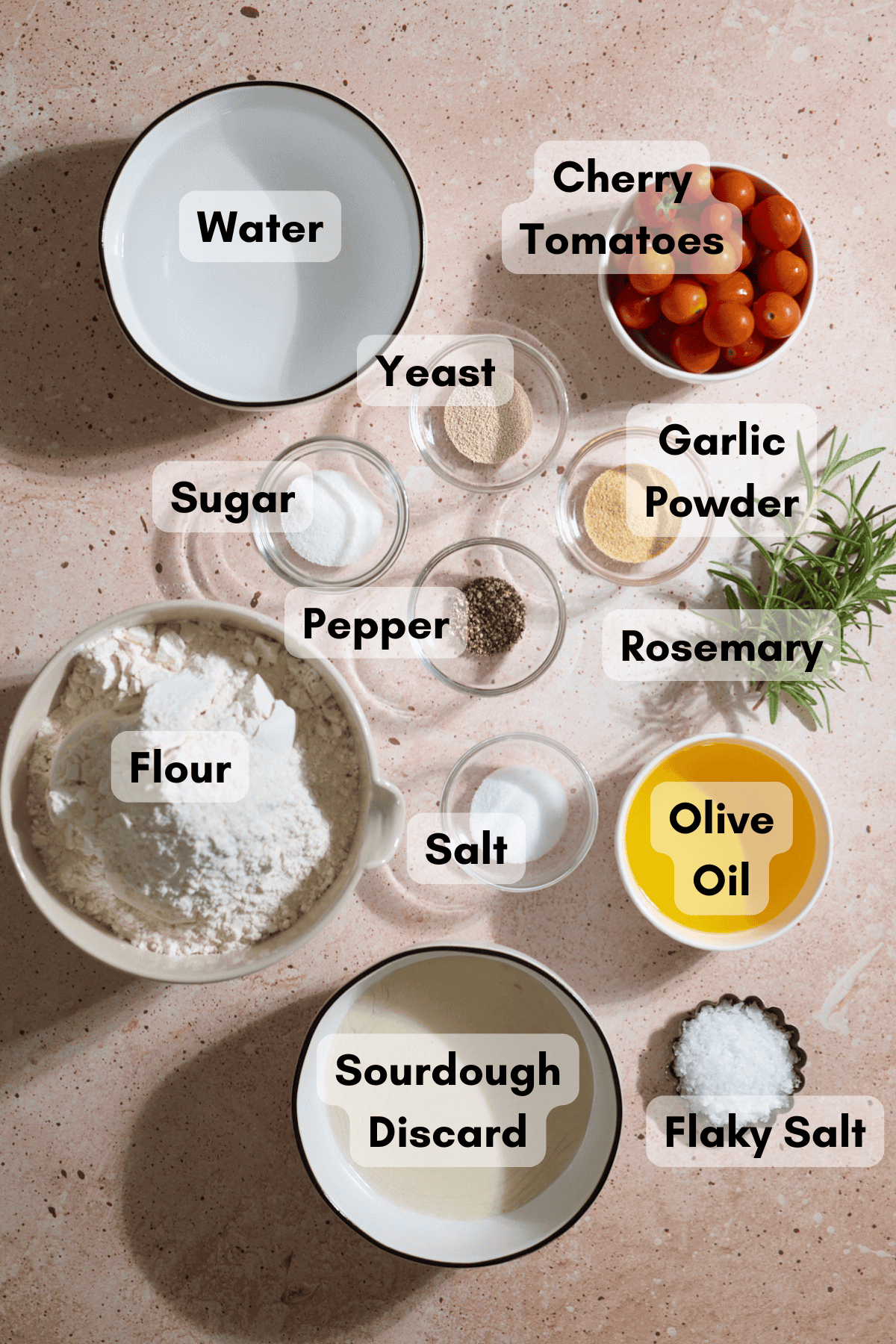 Ingredients for Sourdough Discard Tomato Focaccia in small bowls.