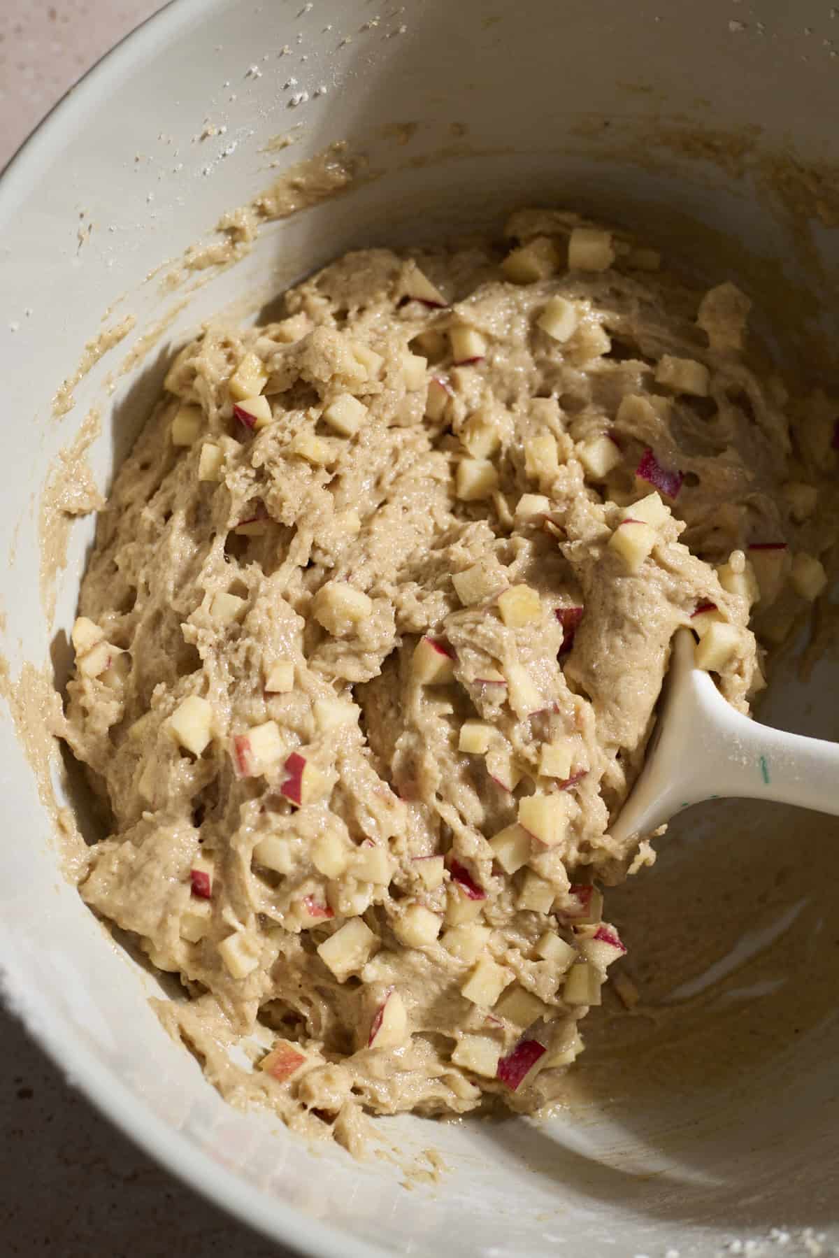 Muffin batter in a large mixing bowl.