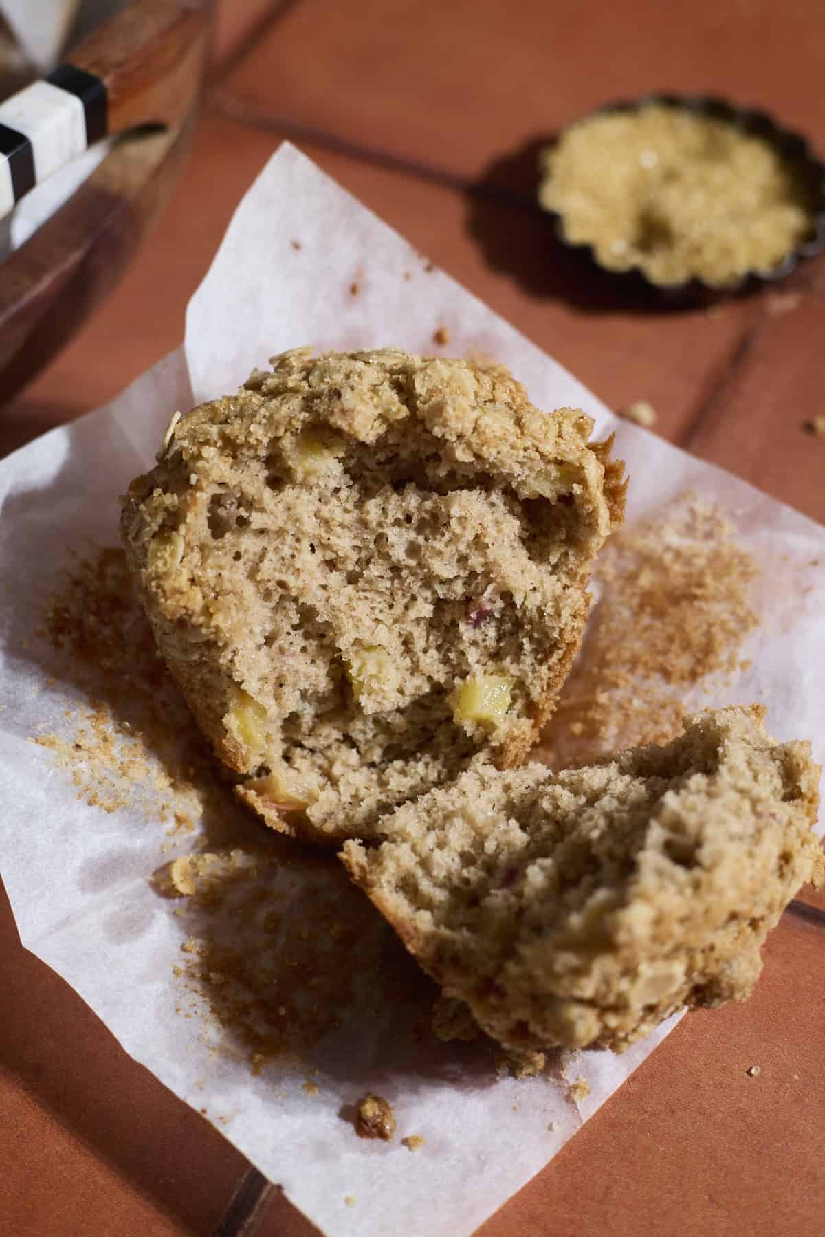 A muffin torn in half to show the interior texture.