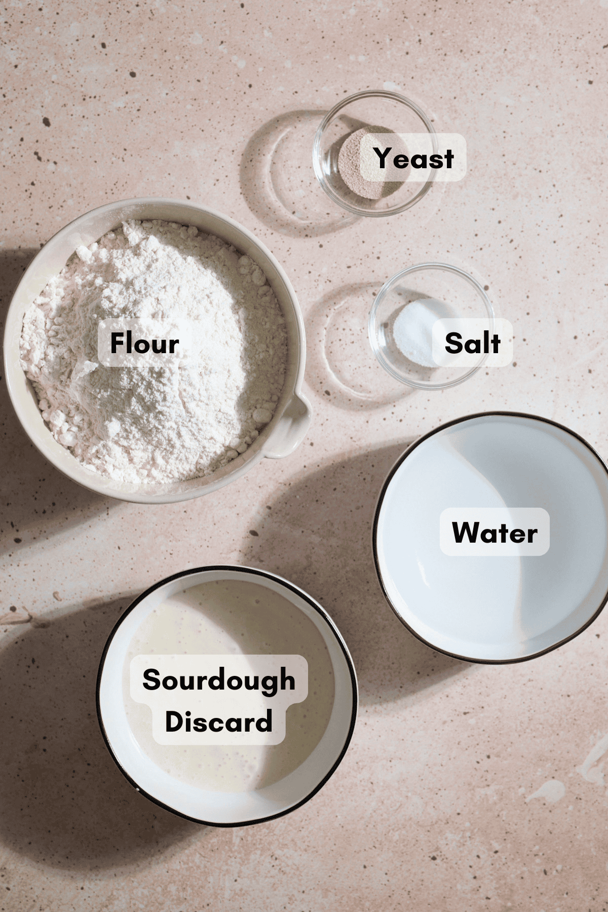 Ingredients for Sourdough Discard Bread in small bowls.