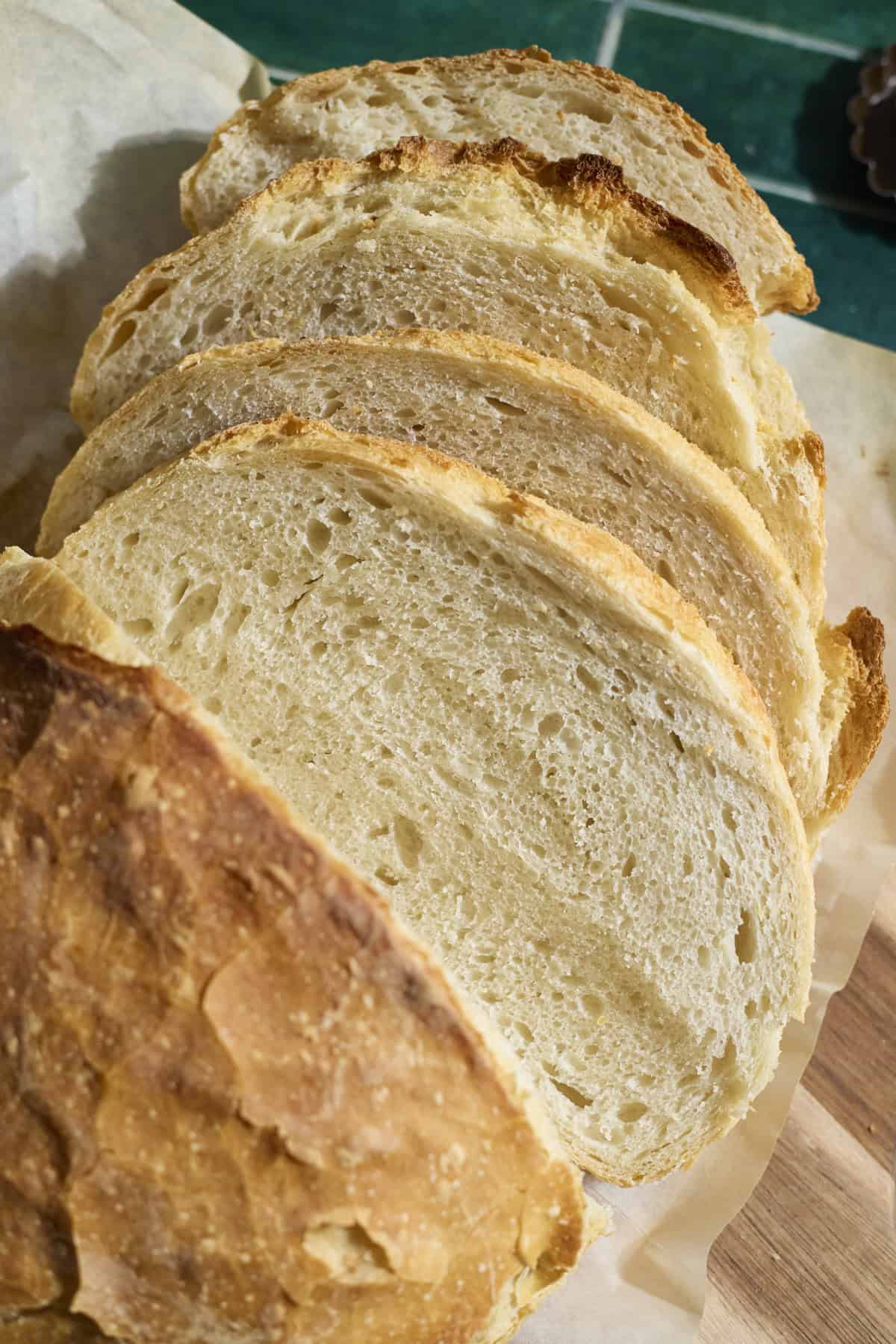 Slices of a Sourdough Discard Bread on a cutting board.