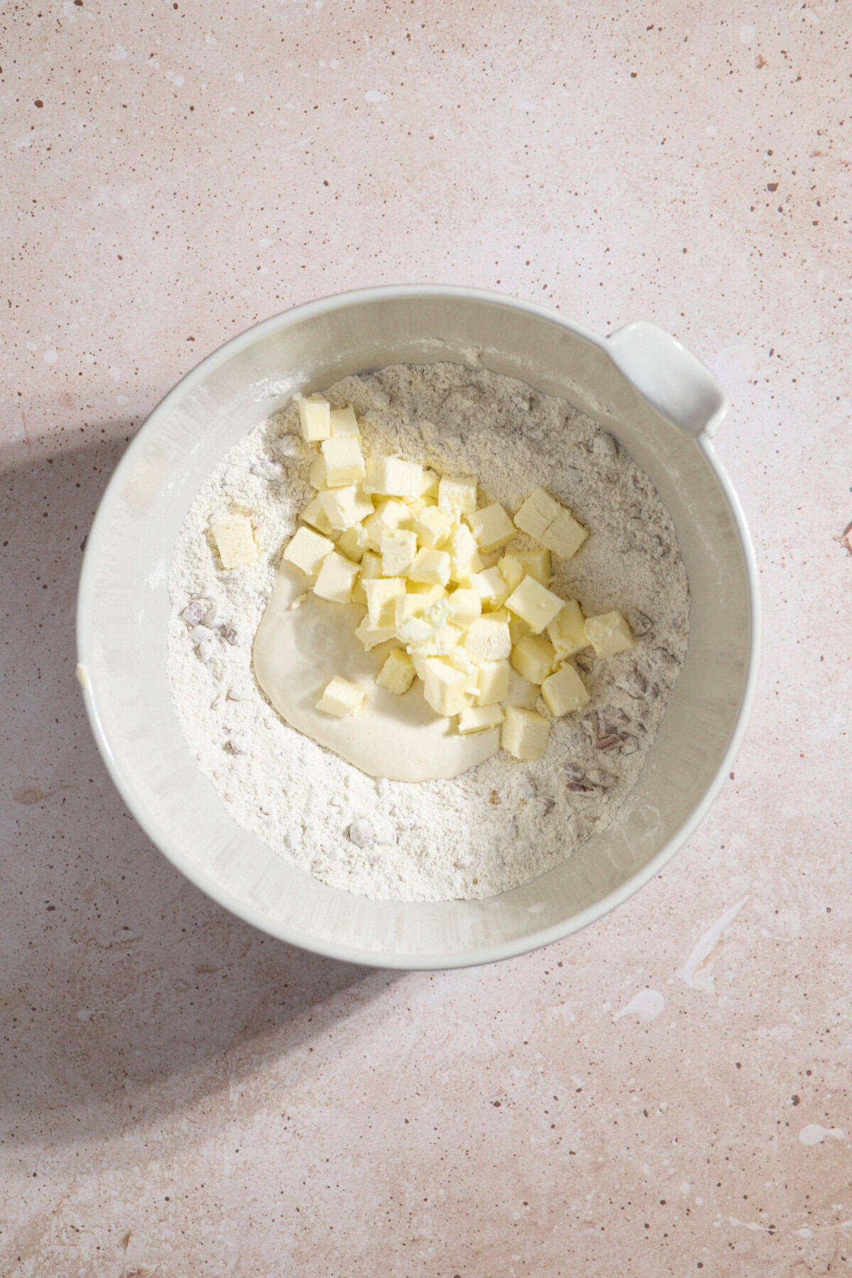 Butter and sourdough discard added to the dry ingredients.