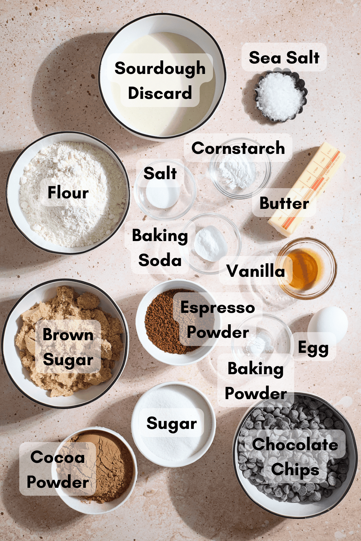 Ingredients for Sourdough Chocolate Espresso Cookies in small bowls.