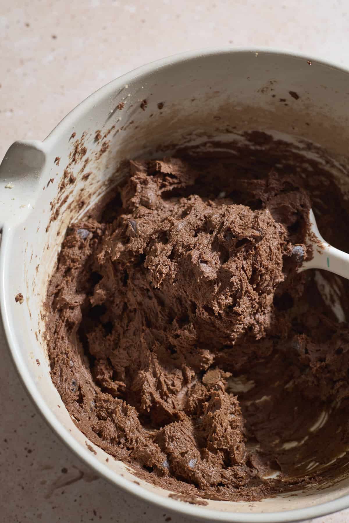Cookie dough in a large mixing bowl.