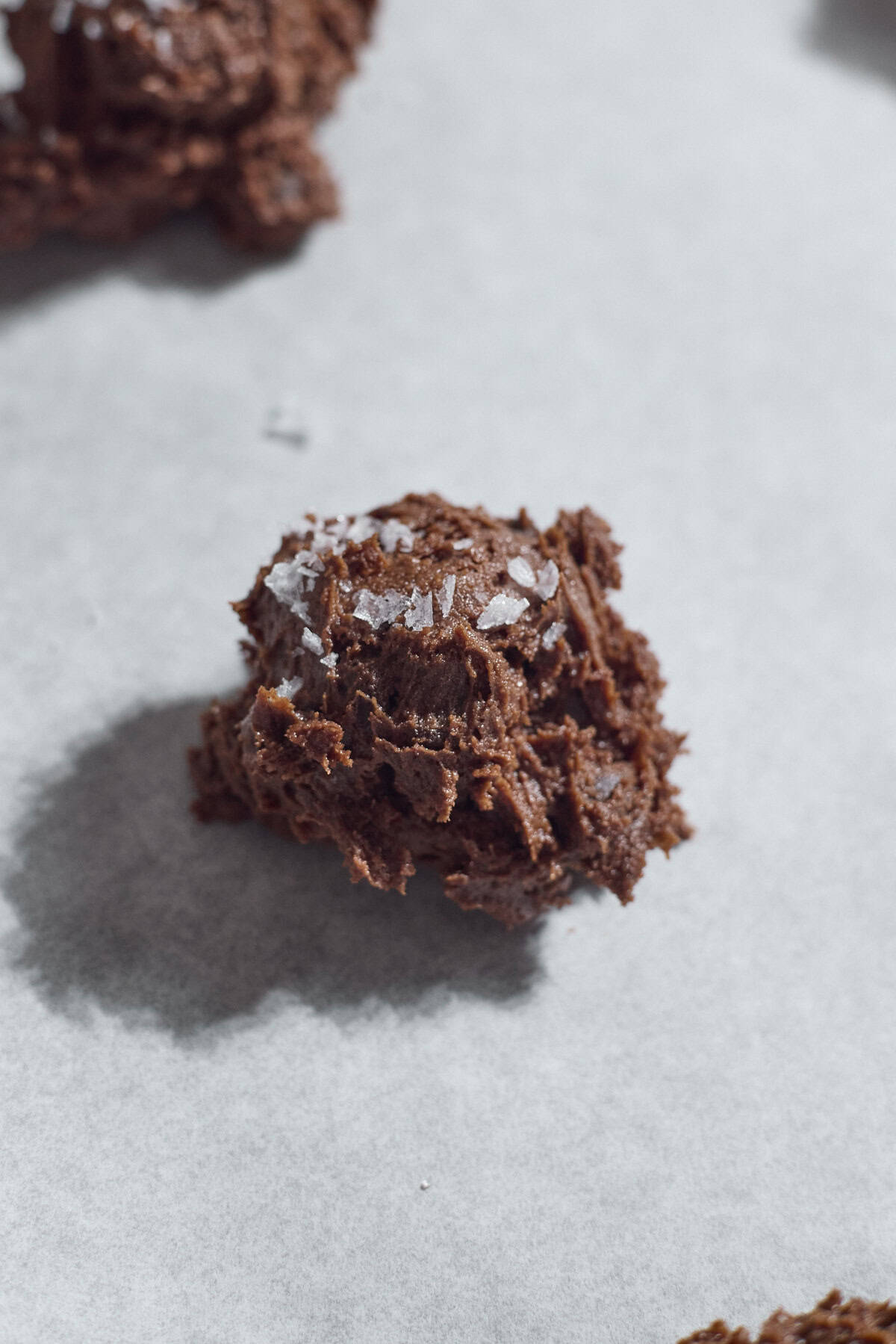 Cookie dough topped with flaky sea salt.