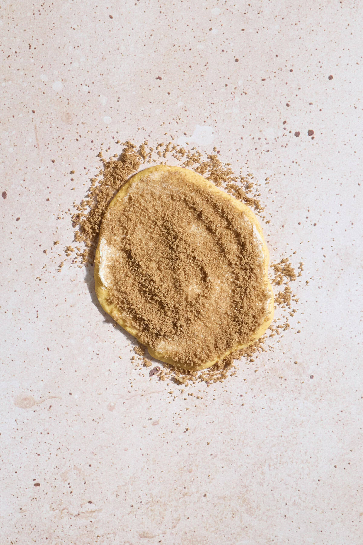 Dough layer sprinkled with sugar mixture.