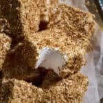 A bite out of a Toasted Coconut Marshmallow.