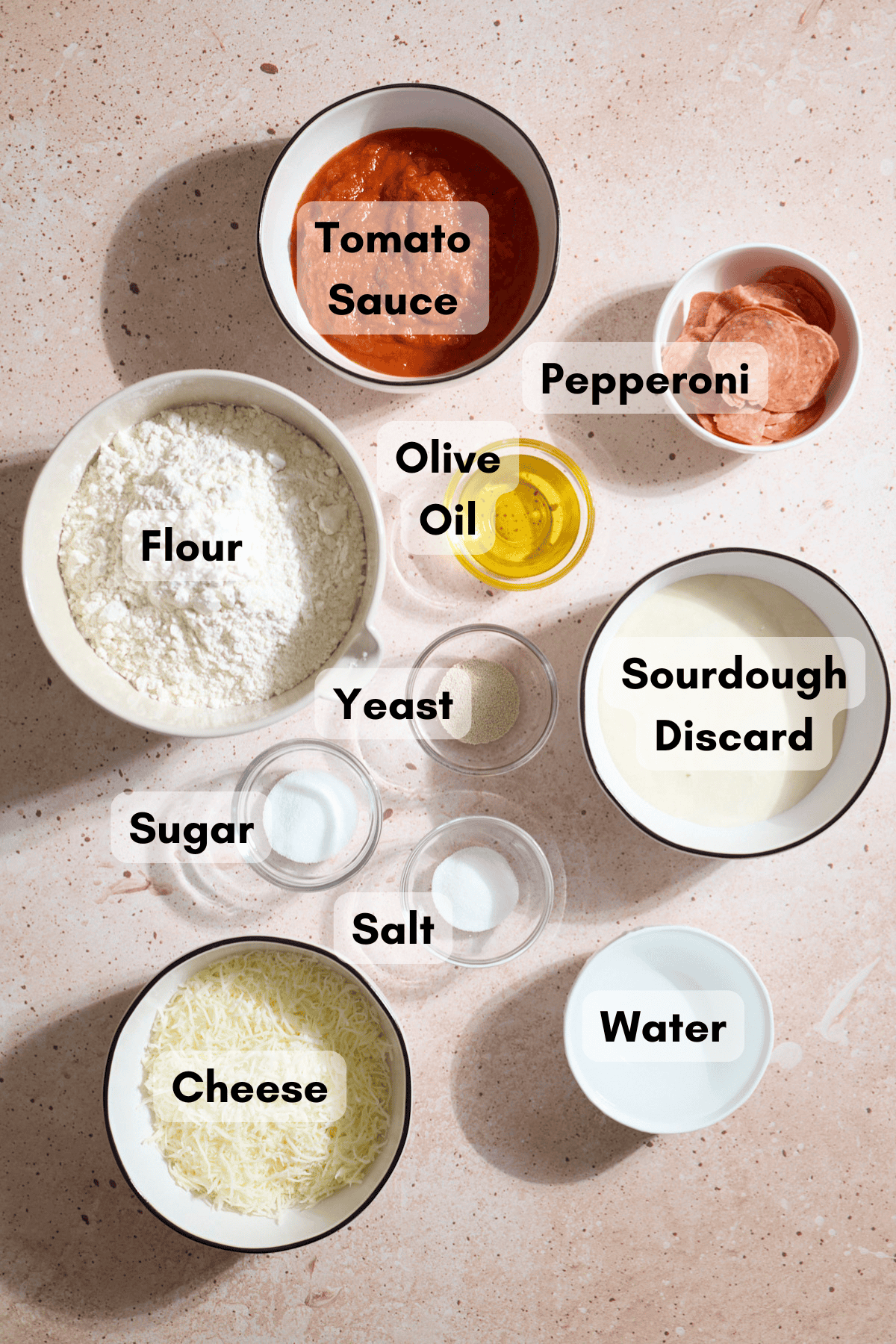 Ingredients for Sourdough Discard Miniature Pizzas in small bowls.
