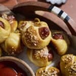A platter of Sourdough Discard Pretzel Pigs in a Blanket.