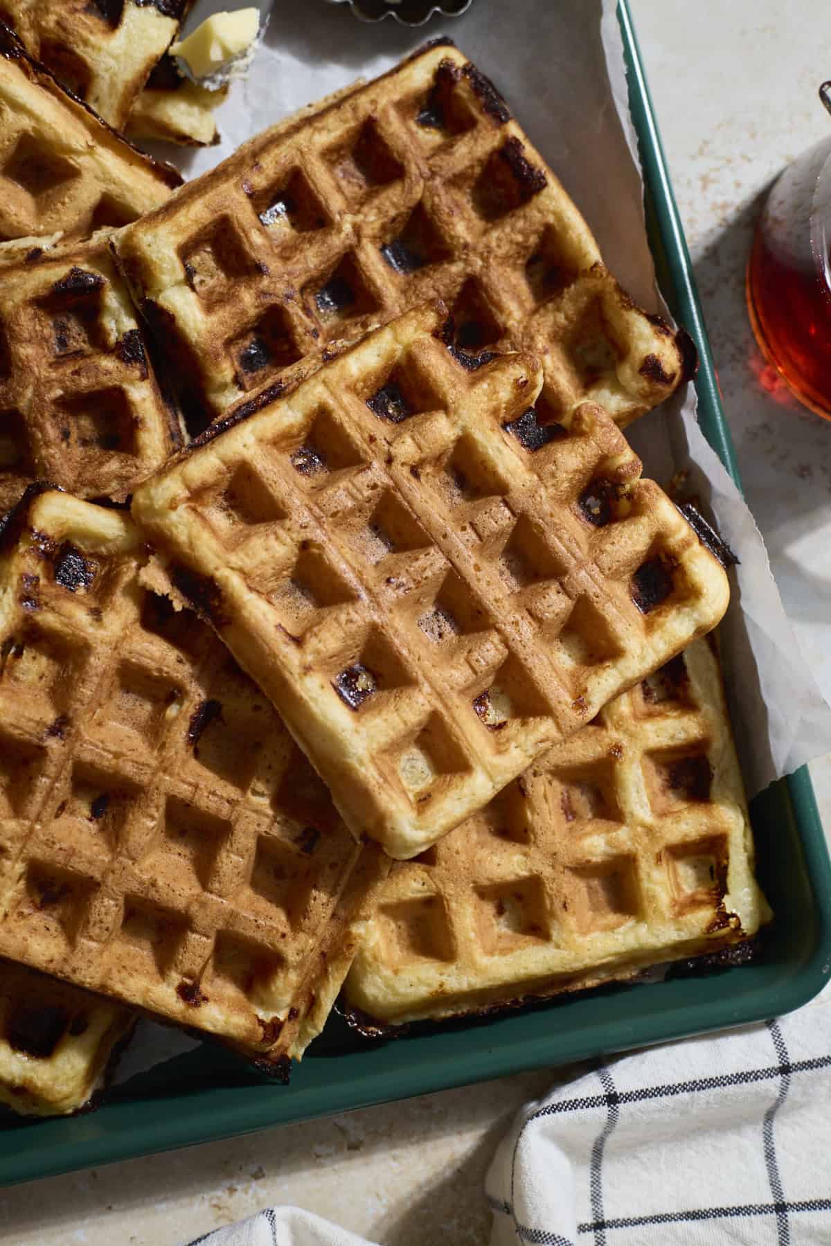 Sourdough Protein Waffles on a green tray.