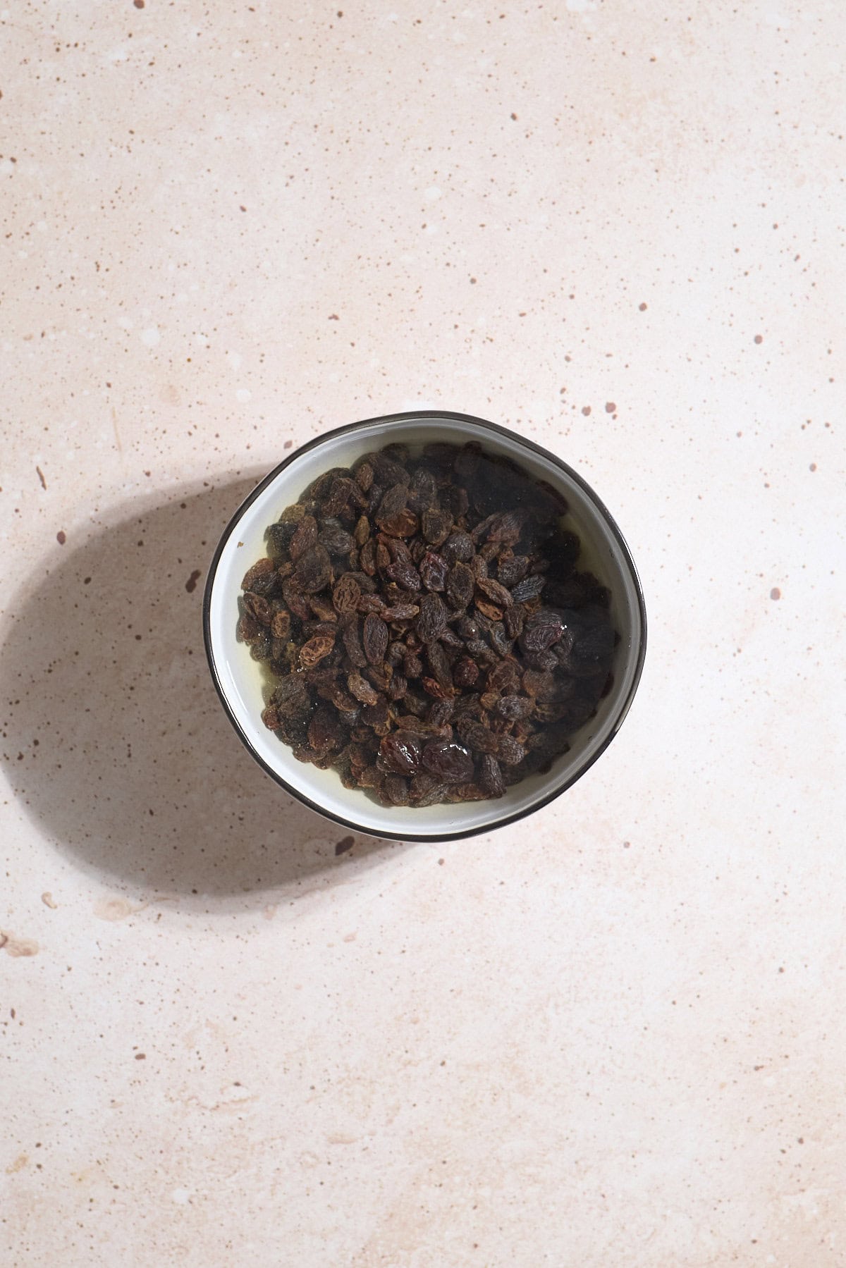 Raisins soaking in water.