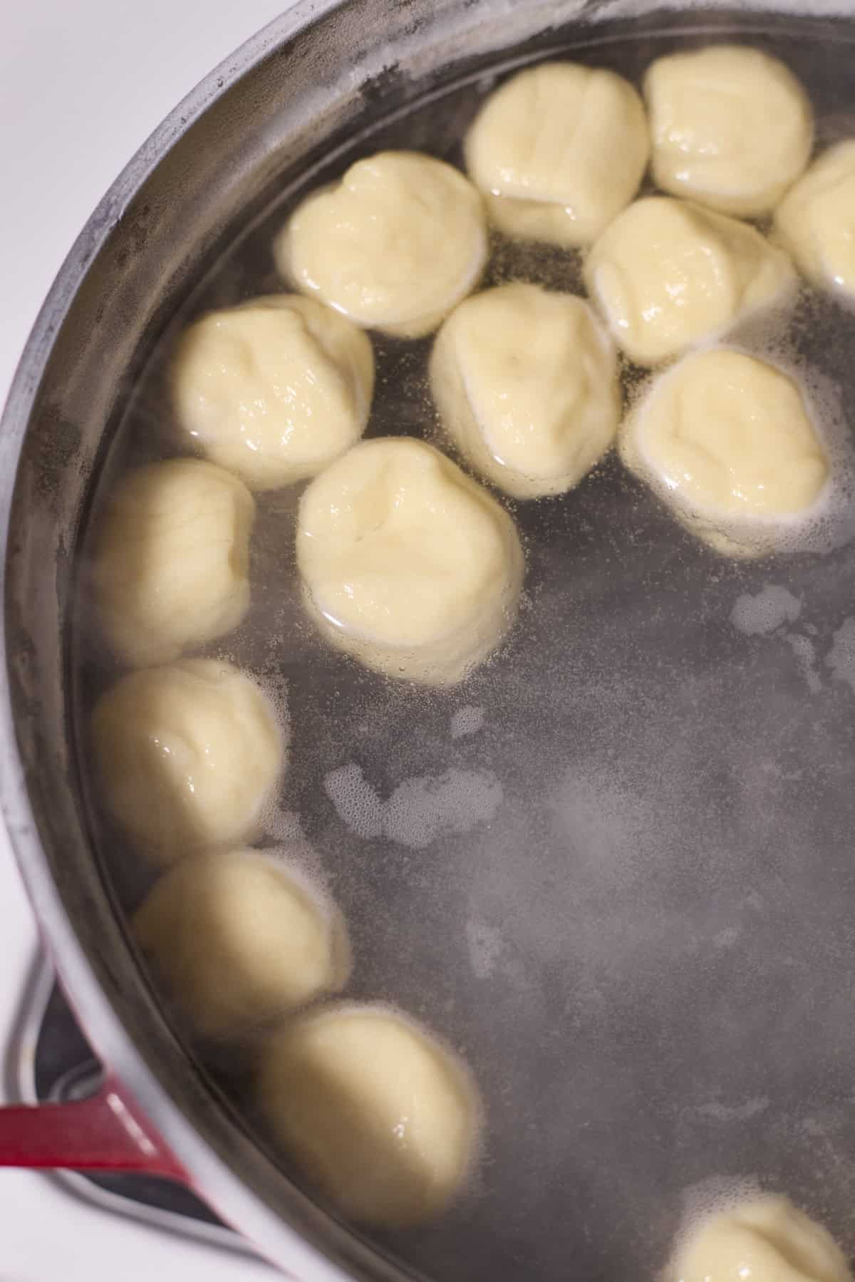 Pretzel bites in boiling water.