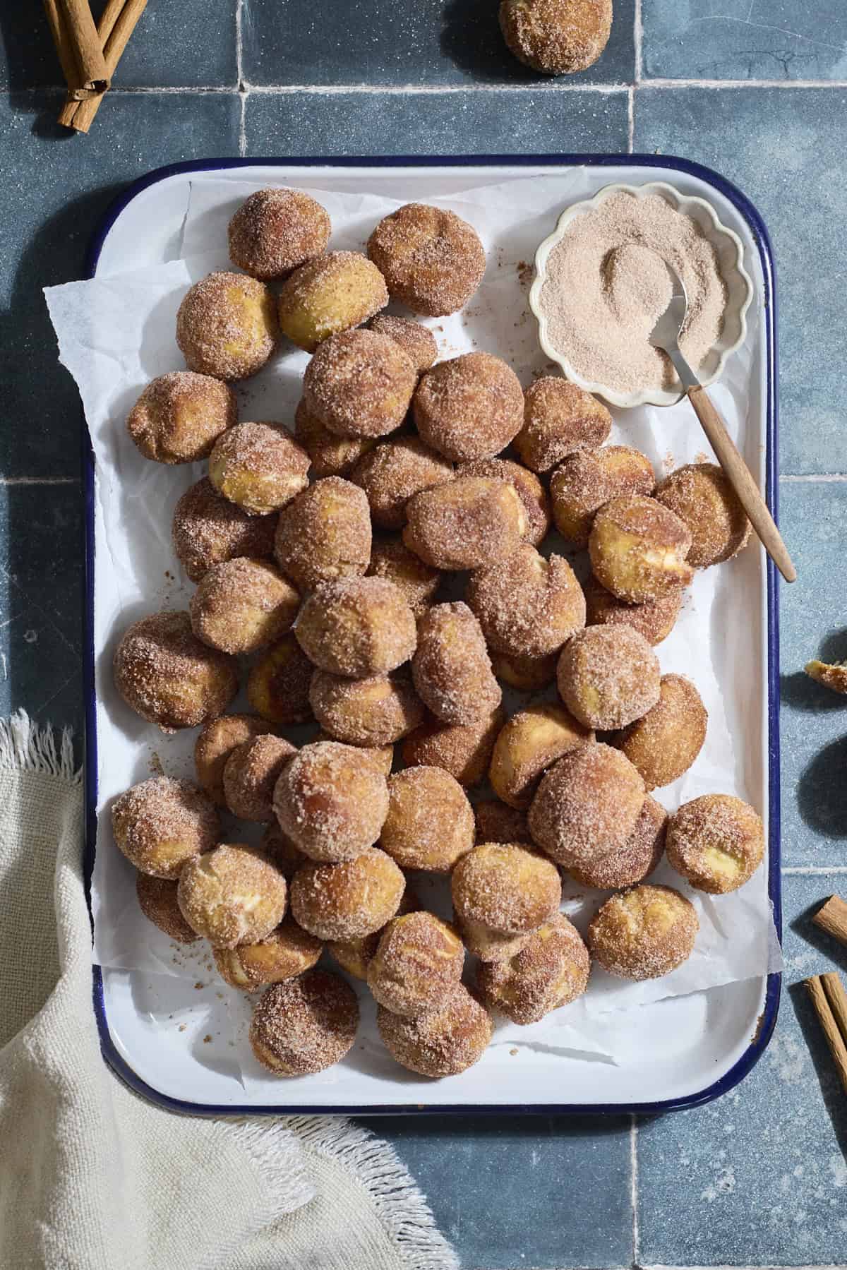 Sourdough Discard Cinnamon Sugar Pretzel Bites on a white platter.