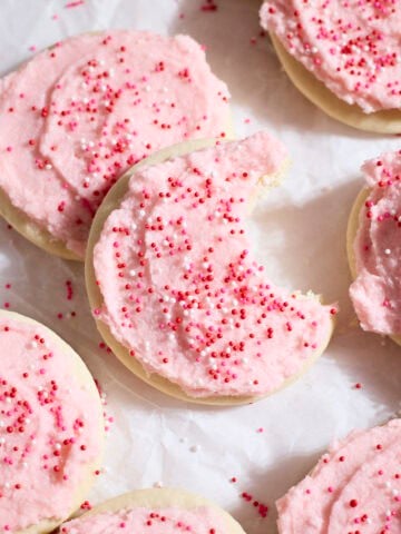 A pile of Sourdough Lofthouse Cookies on a tray.