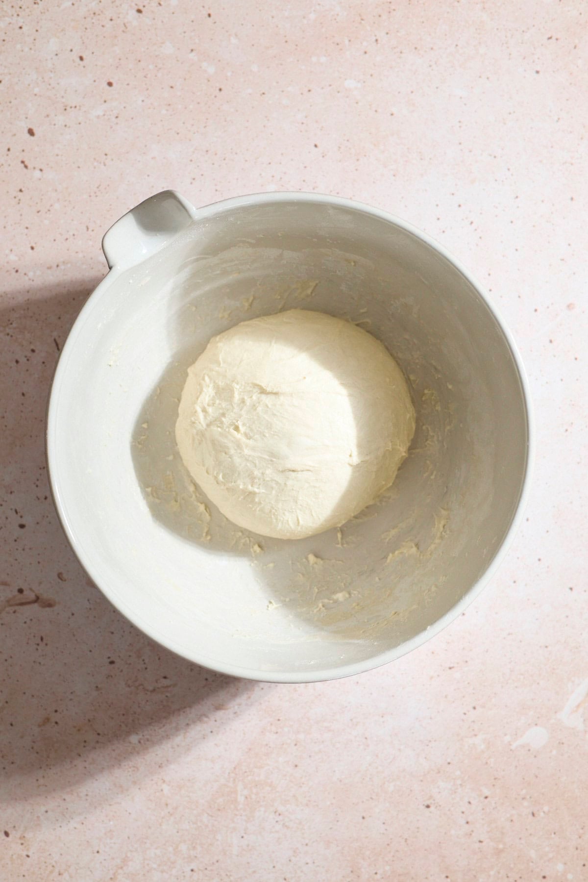 Dough in a large bowl after the third set of stretch and folds.