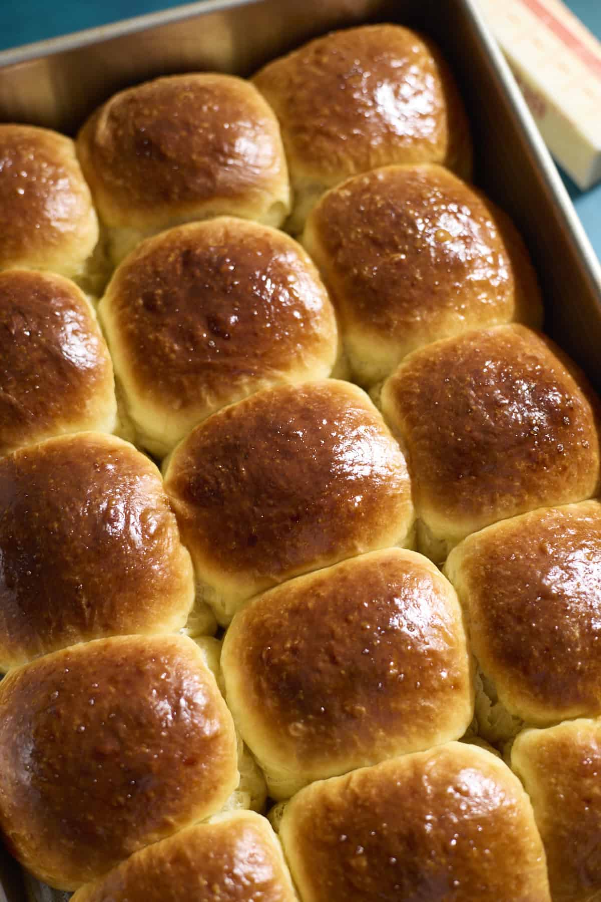 Brioche rolls in the pan after baking.