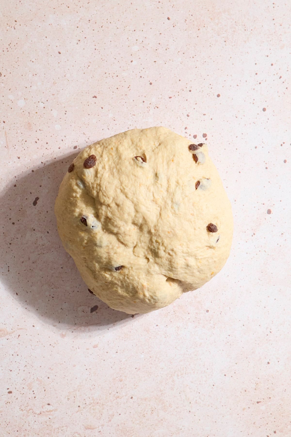 Smooth dough in a ball after kneading.