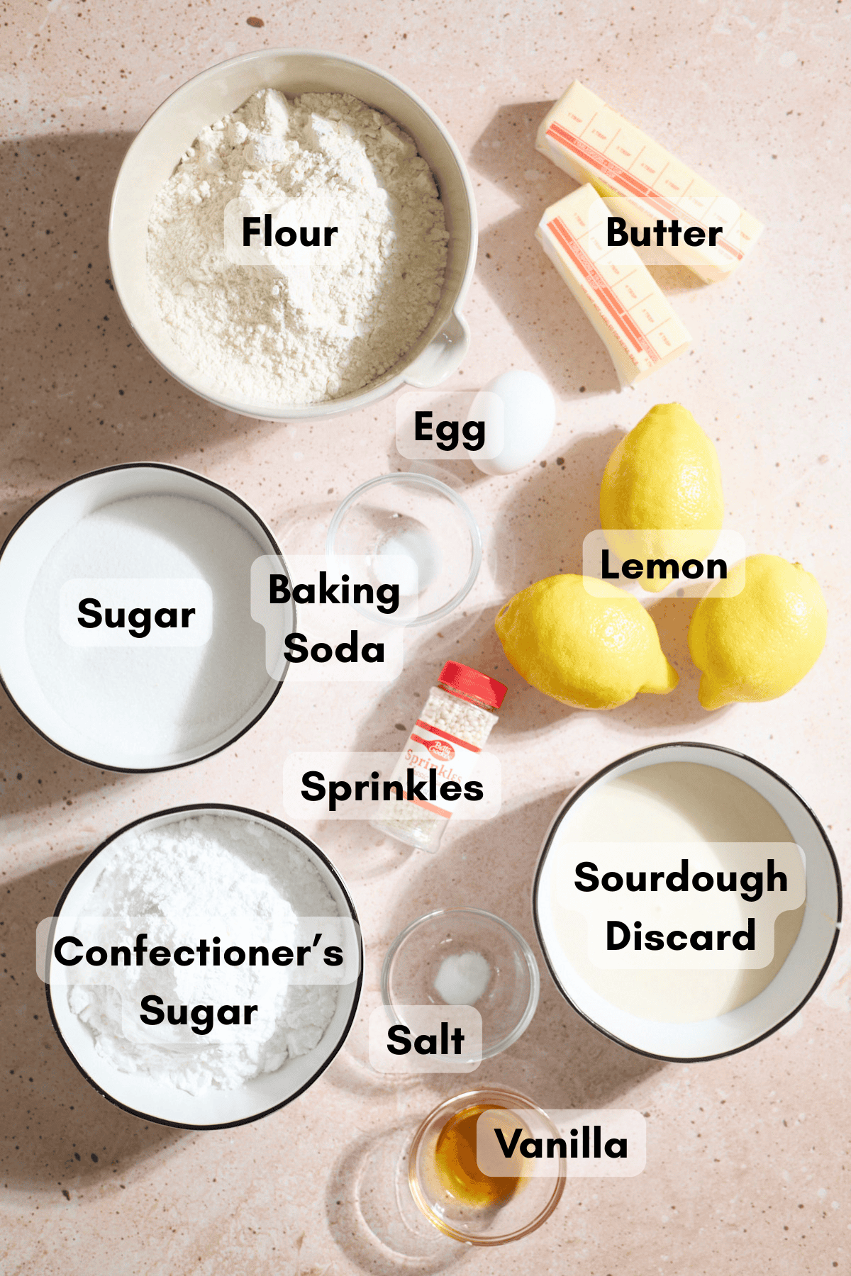 Ingredients for Sourdough Discard Lemon Sugar Cookies in small bowls.